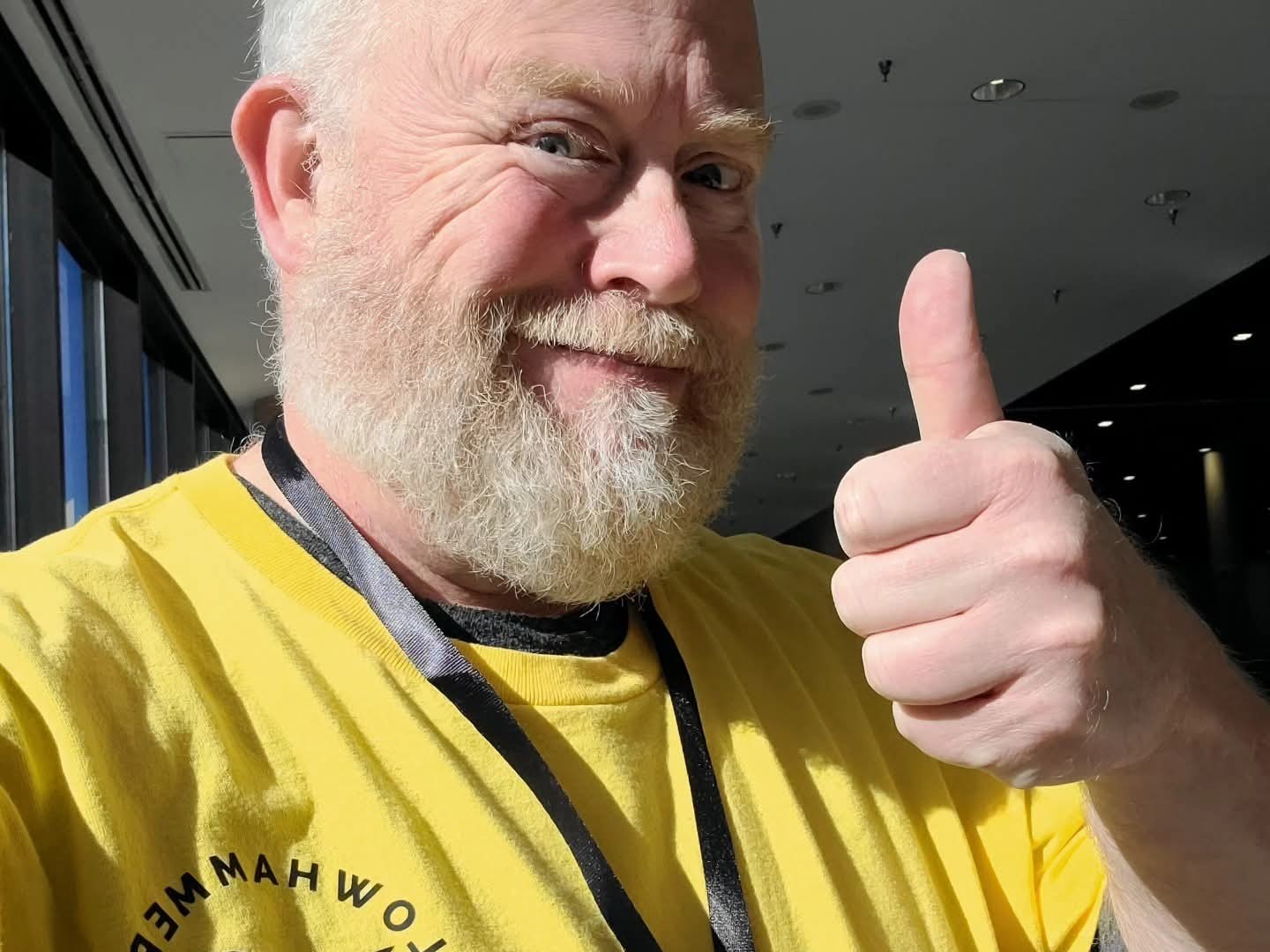 A member giving a thumbs up